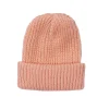Minikane Gordi poppen en Bambinis gebreide muts Marius / kleur zalmroze
