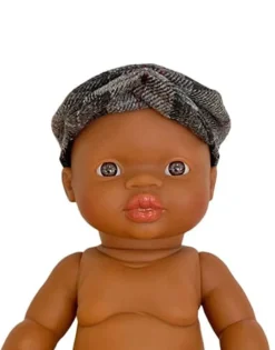 Paola Reina pop jongen Afrikaans lichte ogen